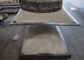 Steel Plate lifted by a large magnet