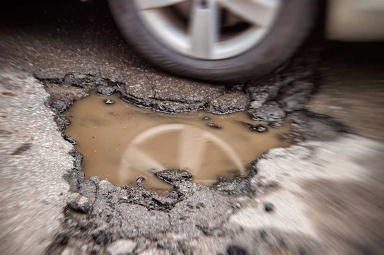 Pothole season is upon us – what do you do to prevent them from forming, and how do you make the area safe?