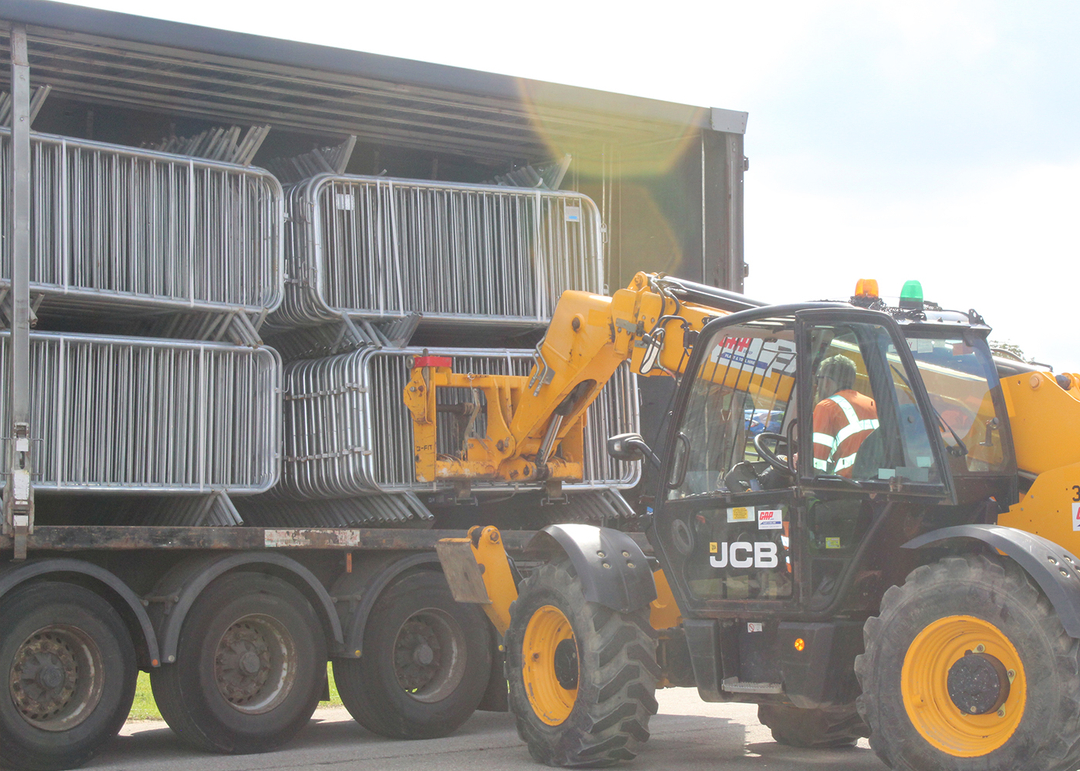 pedestrian barriers being unloaded on site