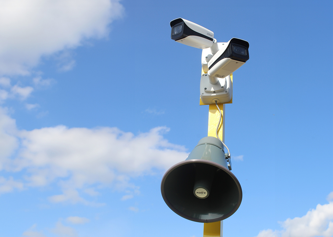 cctv attached with siren alarm on site