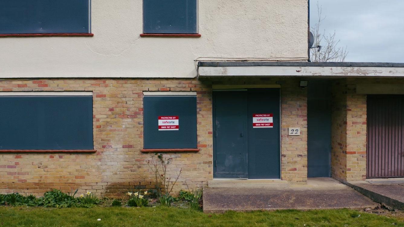 steel door and sitex screens installed on vacant property