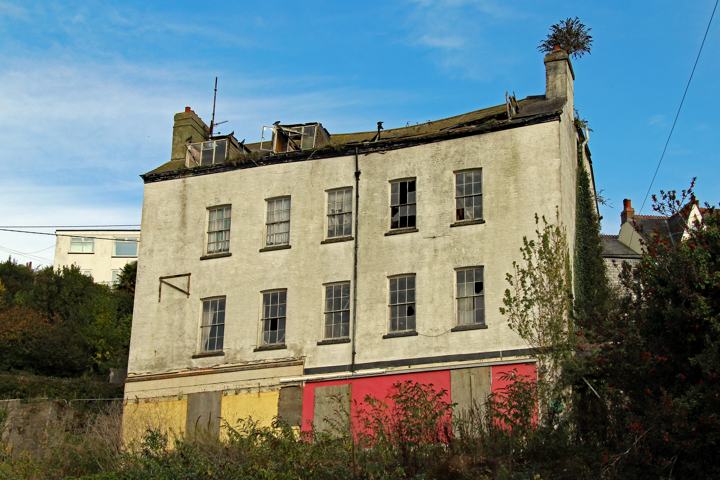 A vacant and boarded up property
