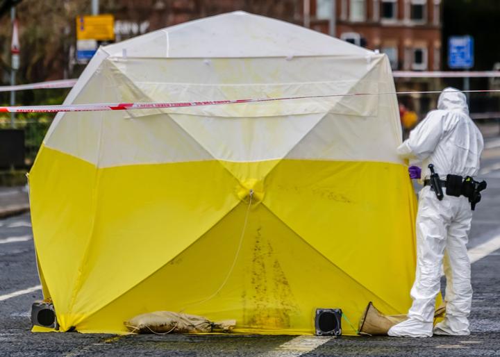 crime scene with tape being used to restrict area