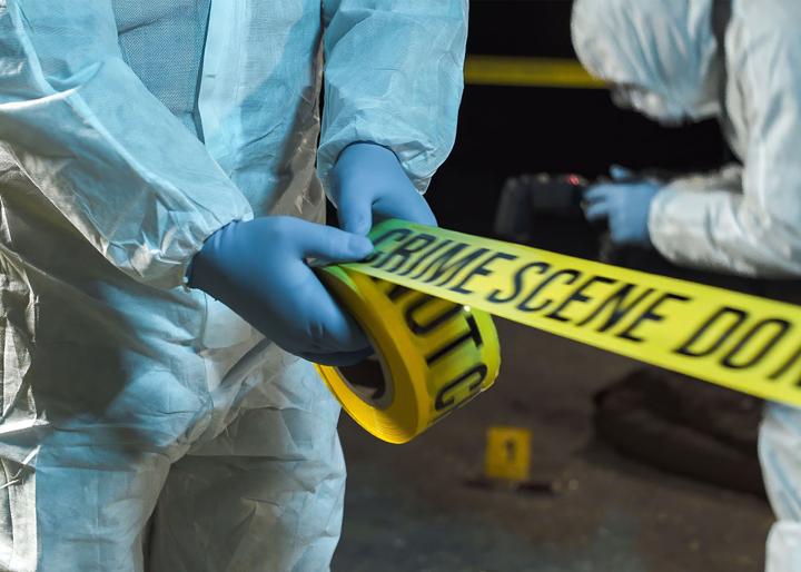 crime scene with tape being used to restrict area