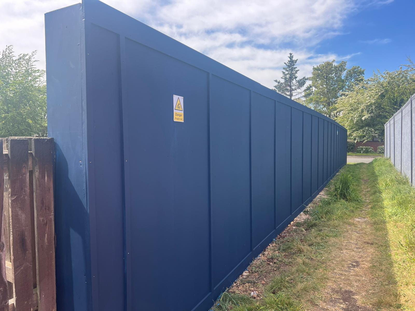In-ground timber hoarding in Worthing