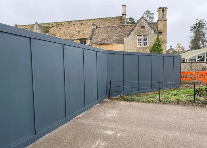 dug in timber hoarding installed