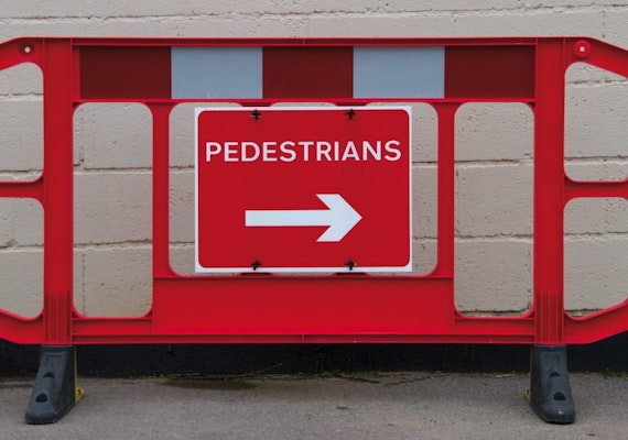 Titan barrier with pedestrian sign