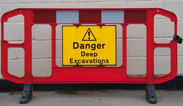 Titan barrier with warning sign