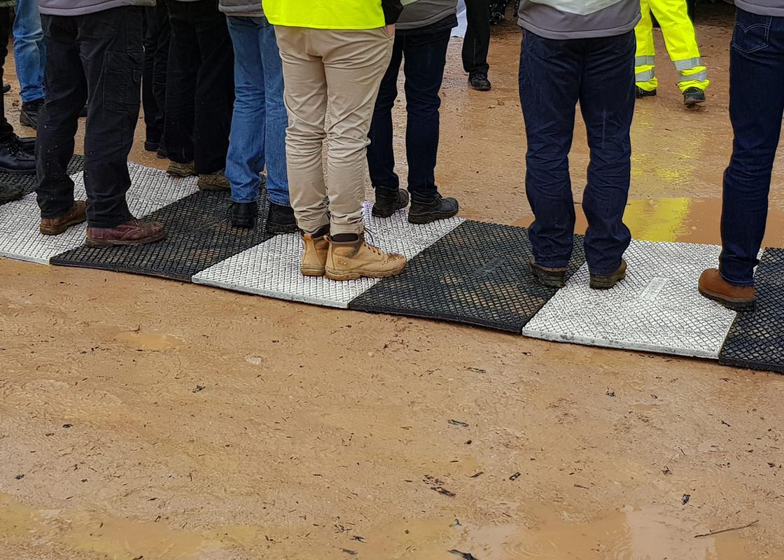 clear path walkway mat being used by staff on construction site