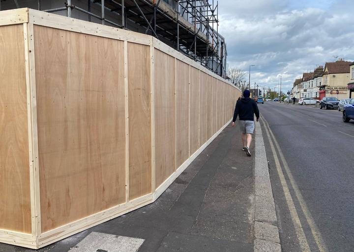 free-standing timber hoarding installed on public site