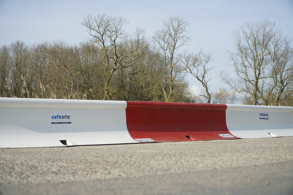 MASS barrier on the side of the road