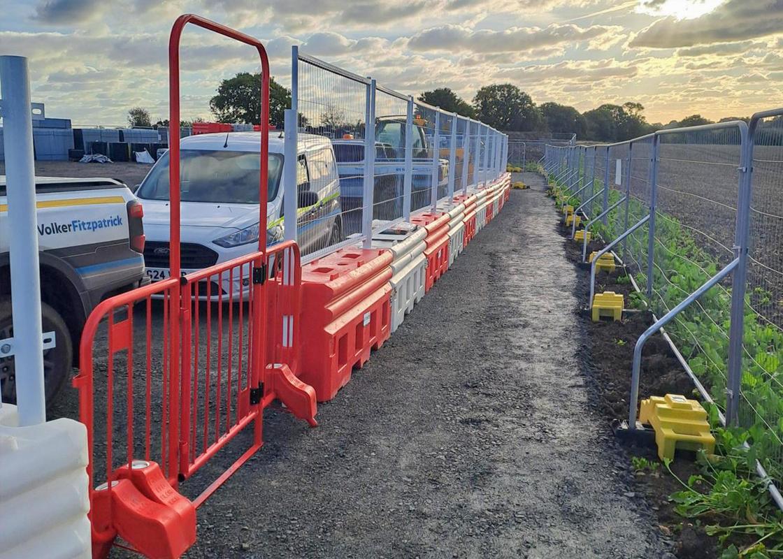 walkthrough barrier with gate attached to RB22 barriers