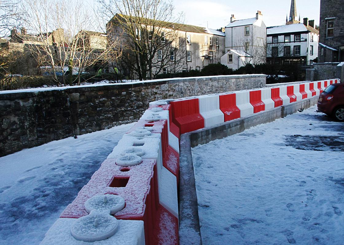 flood barrier 900mm line of barriers in cold snowy weather conditions