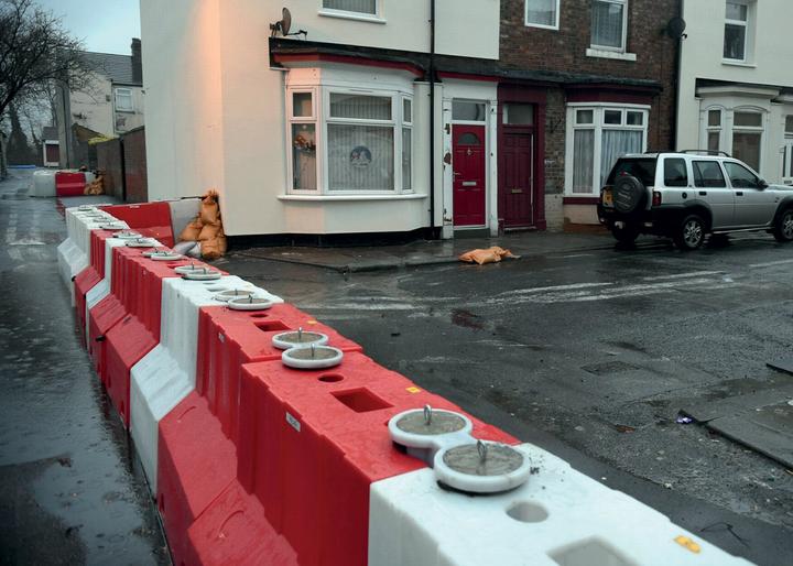 flood barrier 900mm line of barriers closing off street