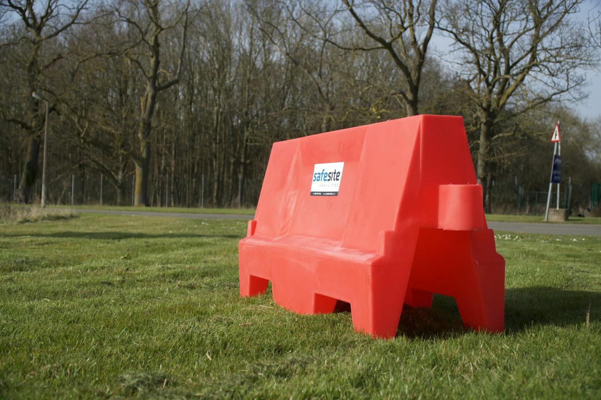 Evo 55 water filled barrier on a field