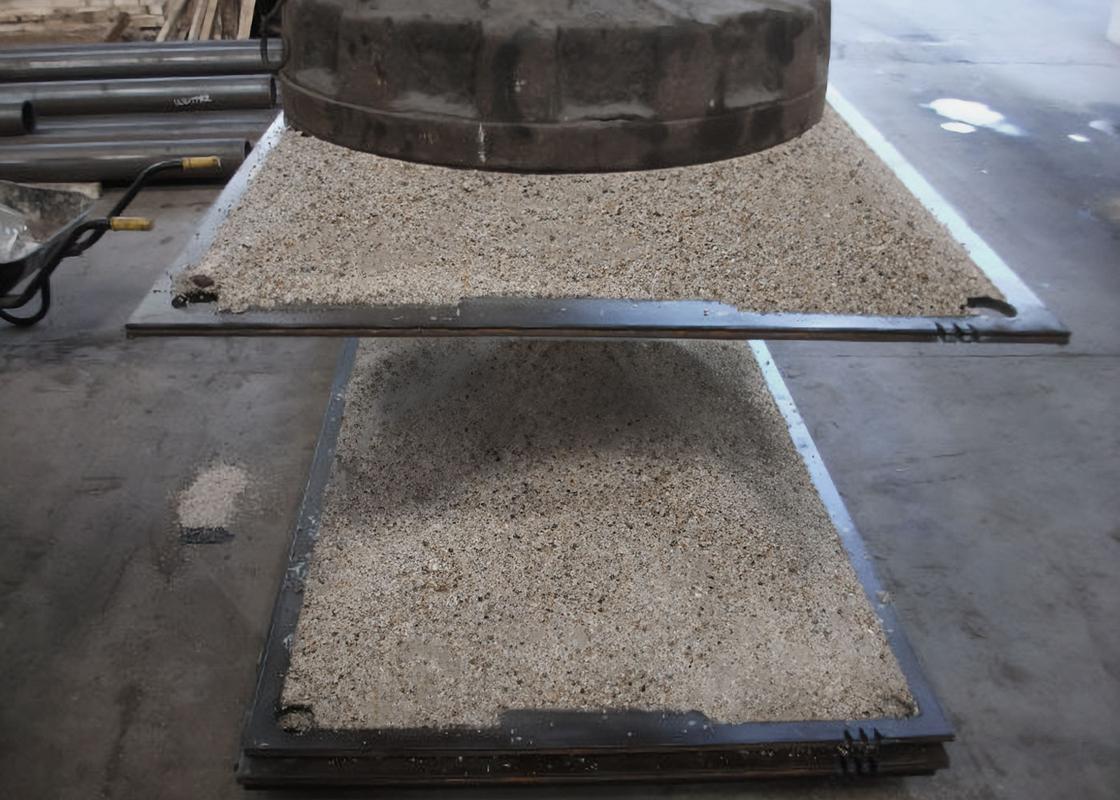 Steel Plate lifted by a large magnet