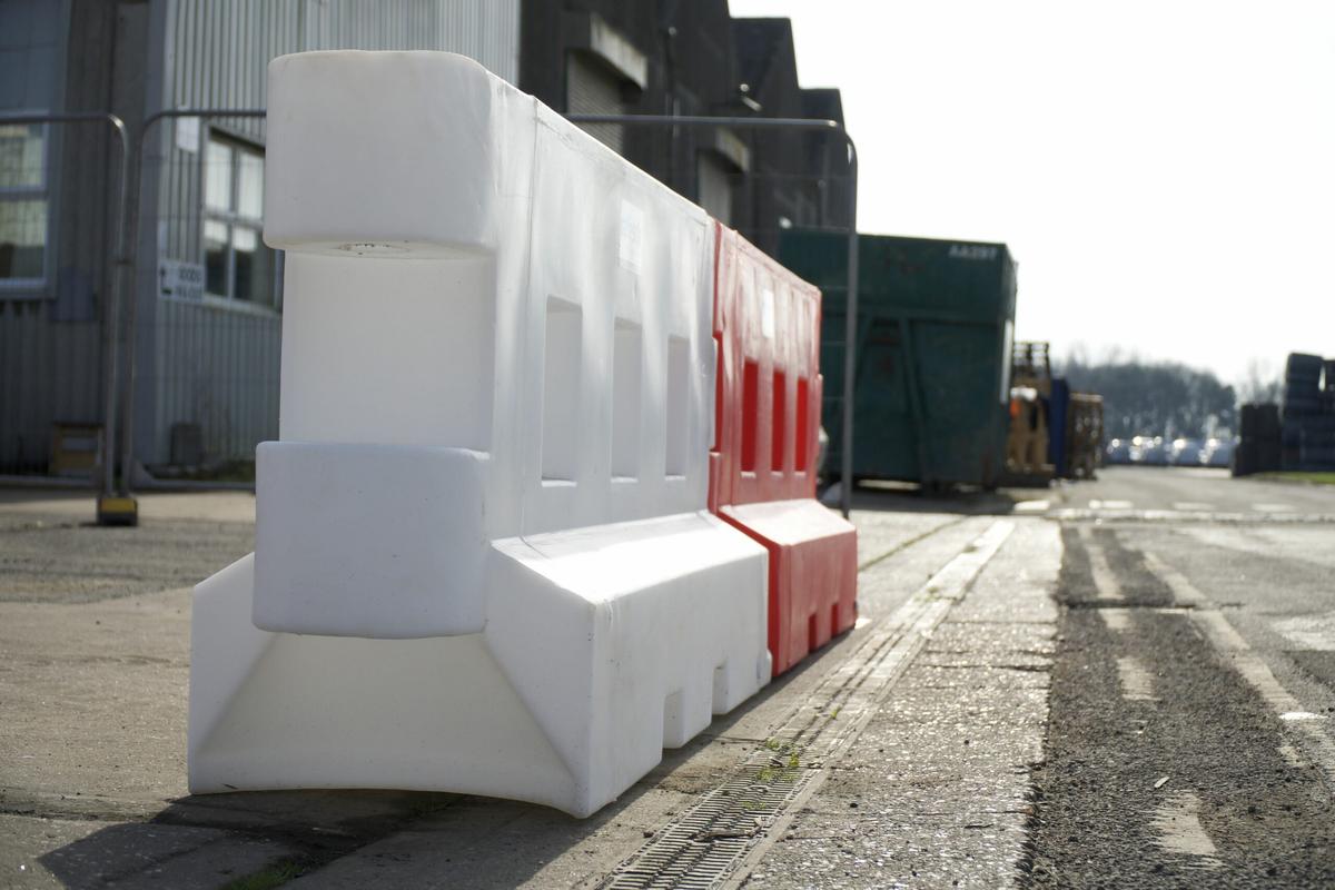 GB2 barrier red and white on the side of the road