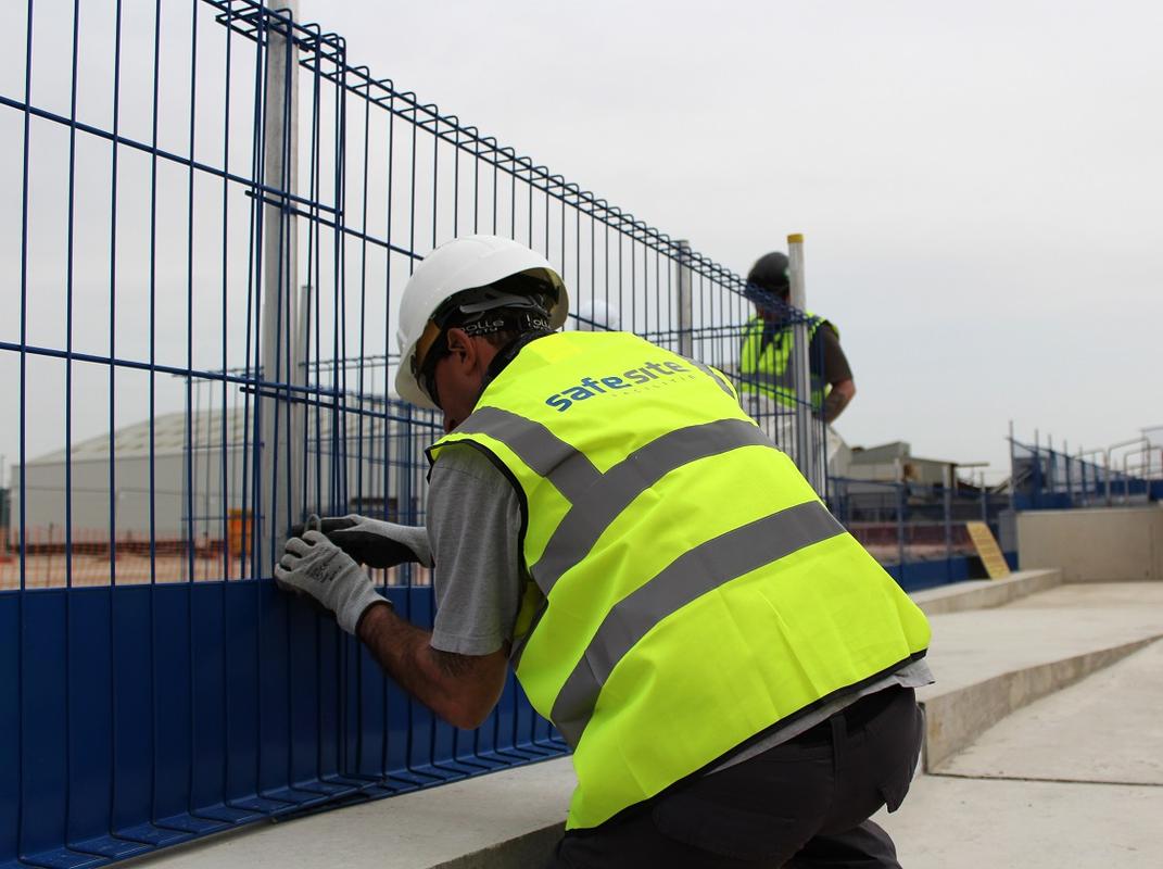 Fitting edge protection barrier fencing