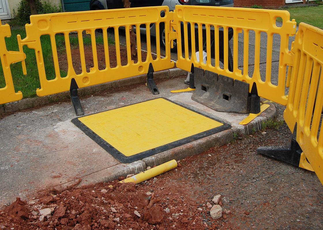 lowpro trench cover 11x11 covering pavement hole
