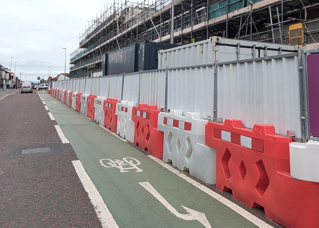 bison barrier with hoarding