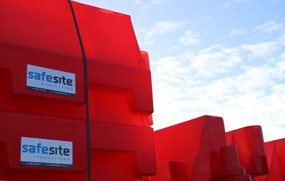 Used water filled barriers in sun