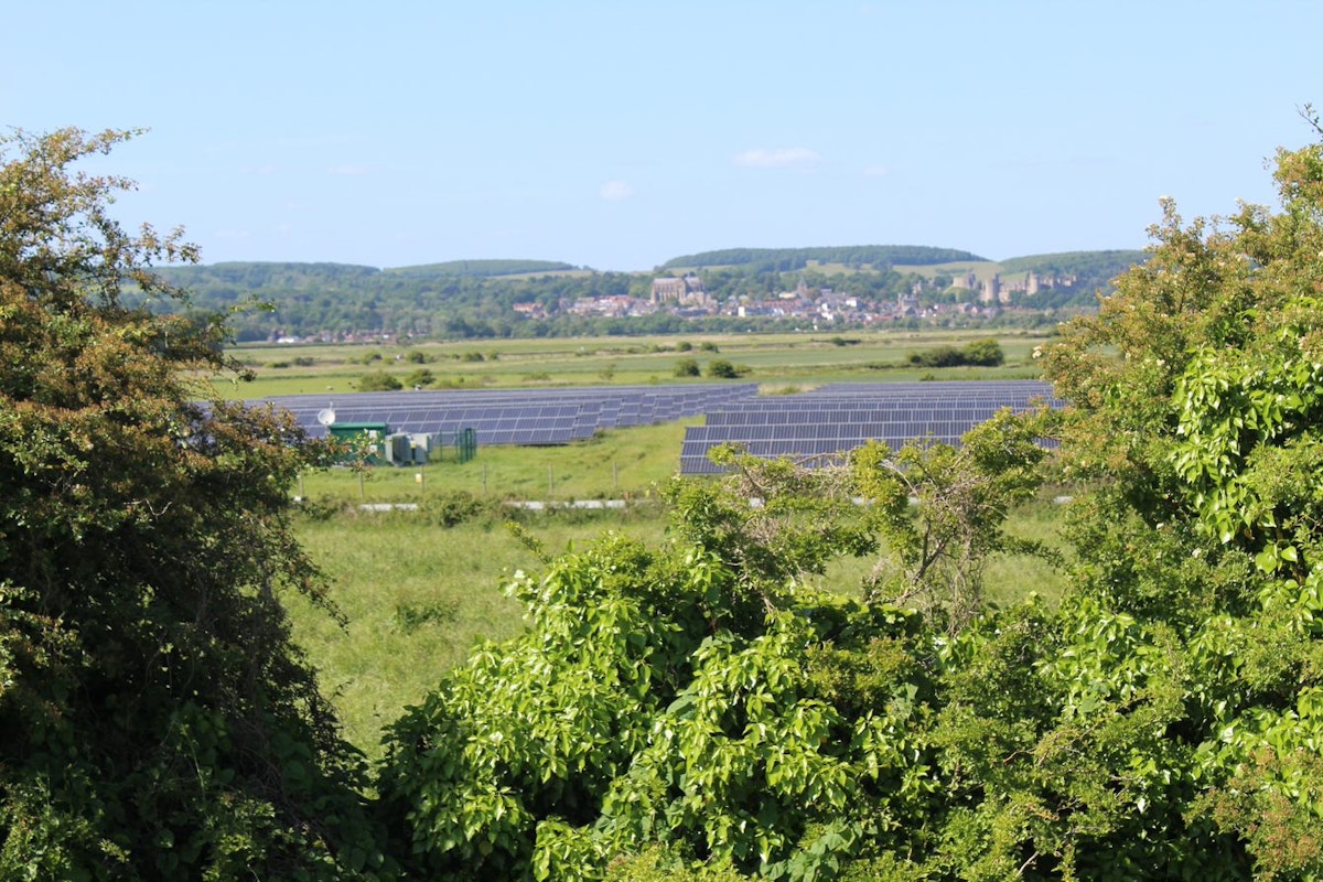 rows with solar panels and Arundel castle