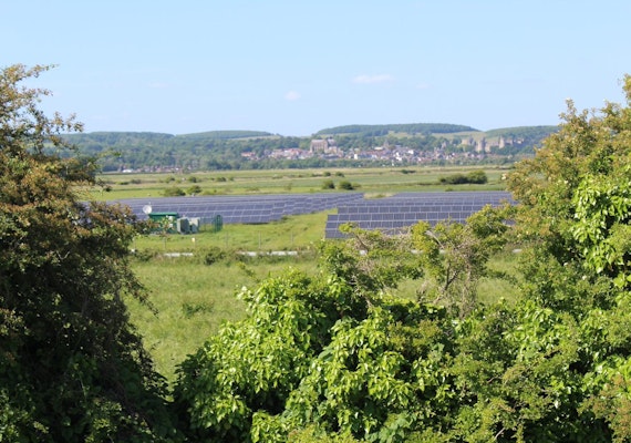 rows with solar panels and Arundel castle