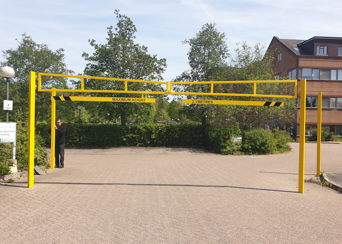 Height Restrictor barrier preventing large vehicles from entering a residential carpark