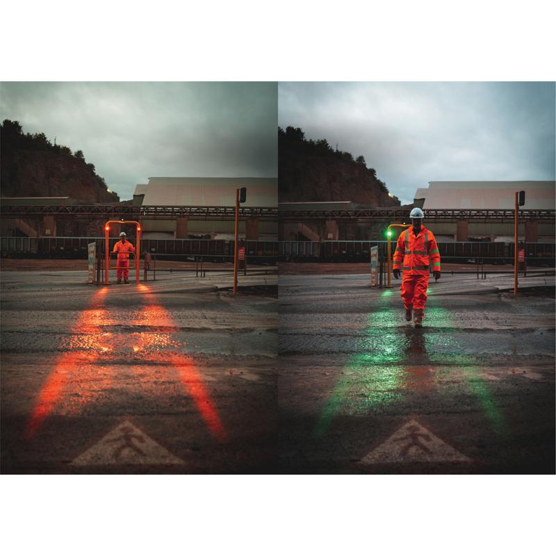 Person walking on illuminated walkway