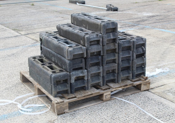 Stacked pallet with rubber fence feet