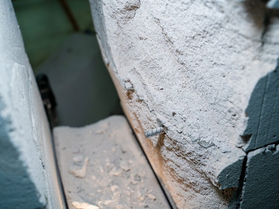 What can be done to secure buildings from crumbling concrete?