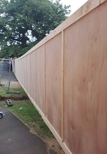 Dug-in Timber Hoarding with Pedestrian Gate