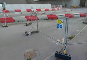 Novus barriers surrounded by Heras fencing