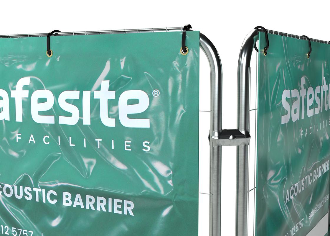 Acoustic barrier in line secured to temporary fencing