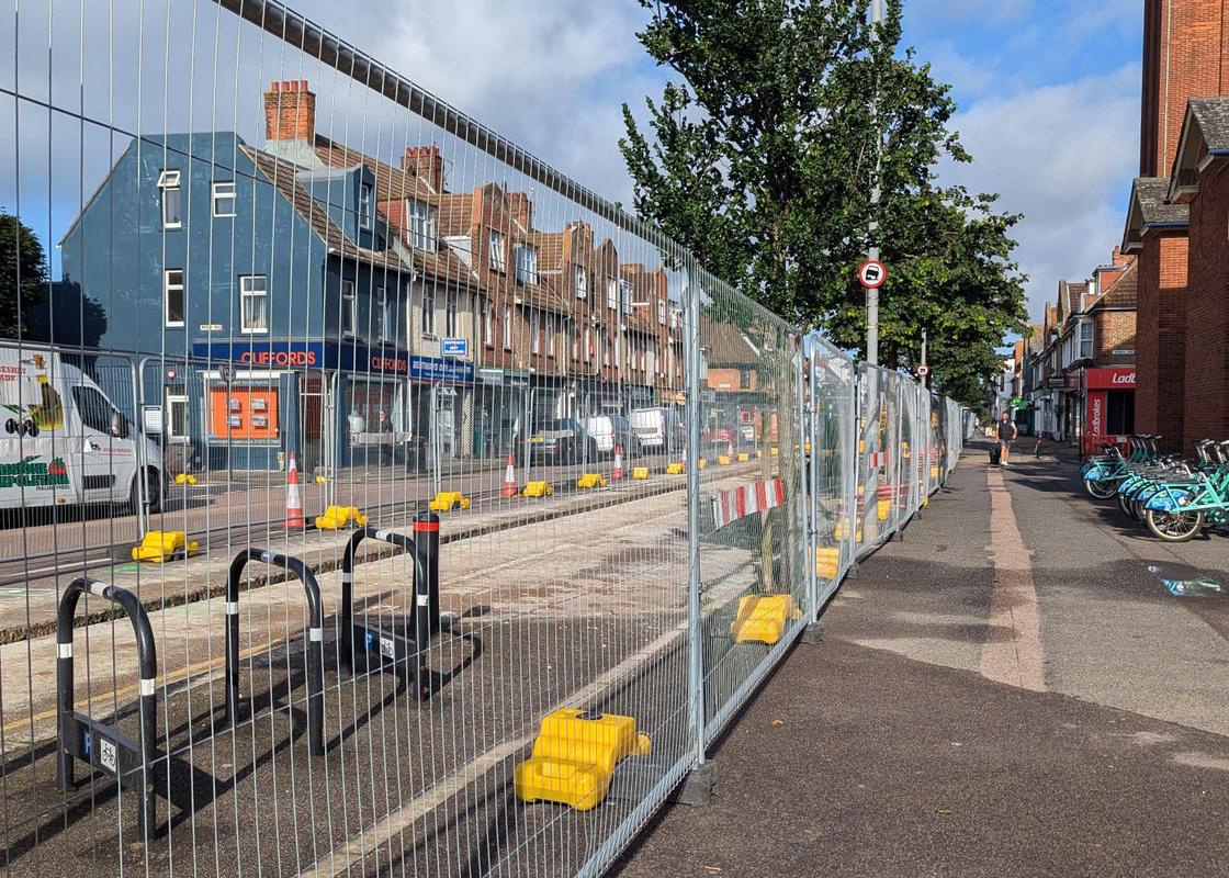 stepped ballast block with fencing in public street-works