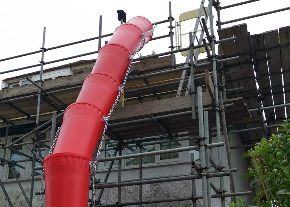 20 inch rubbish chutes attached to building and scaffolding