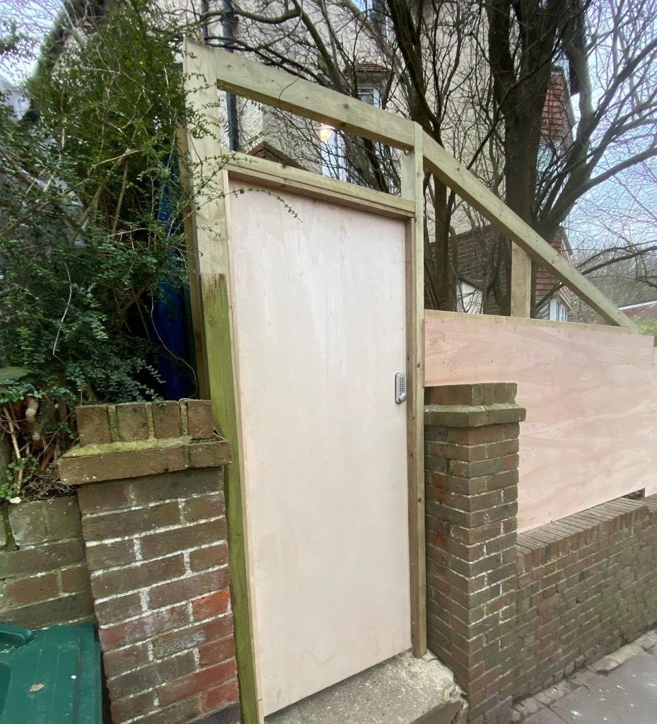 timber hoarding with timber door and digi lock
