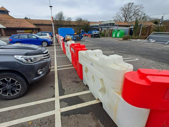 bison barriers used supermarket carpark