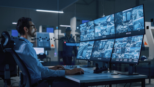 A security operator running a remote monitoring centre