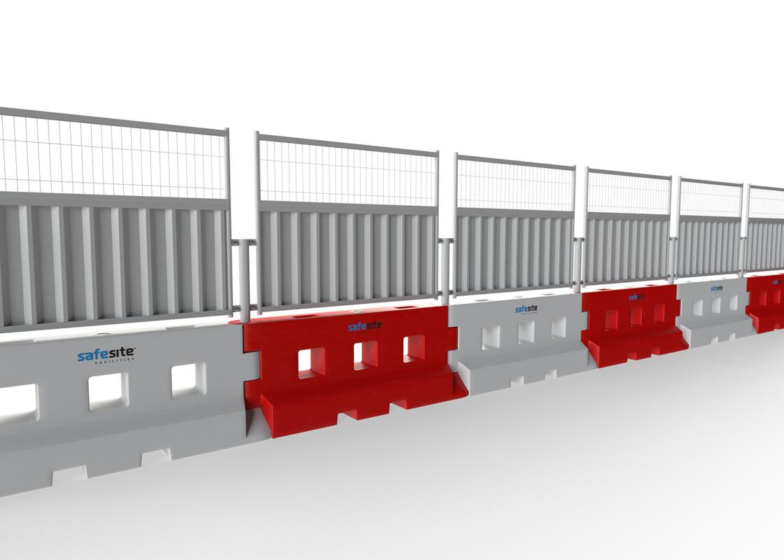Line of GB2 water filled barriers with half mesh and half hoarding fencing from the reverse side
