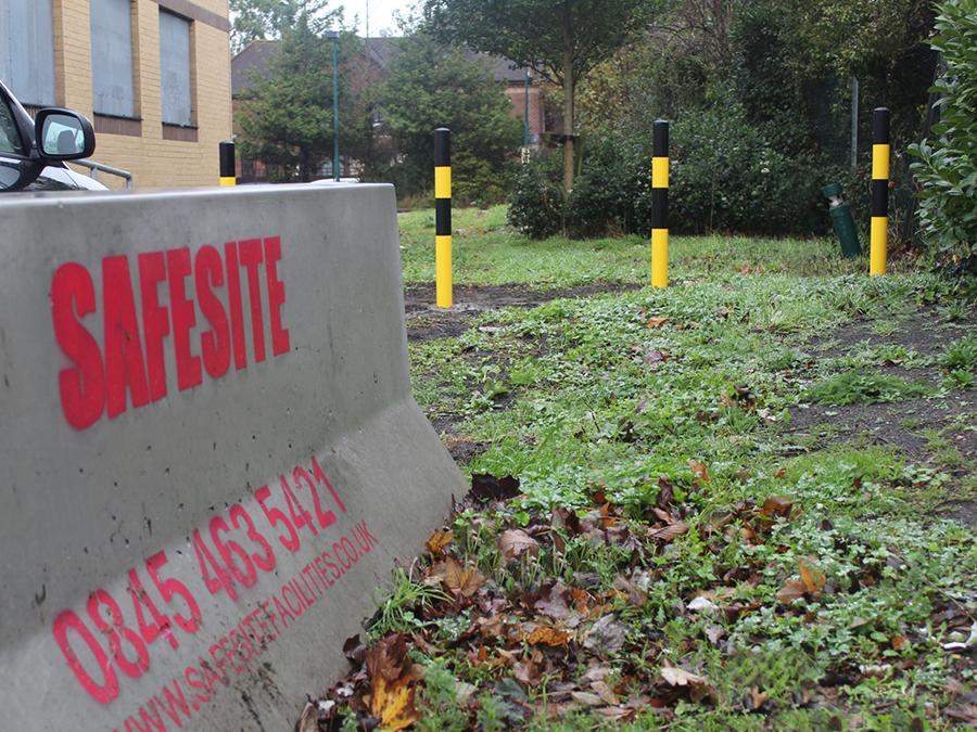 Four Heavy Duty Bollards Securing Site Entrance