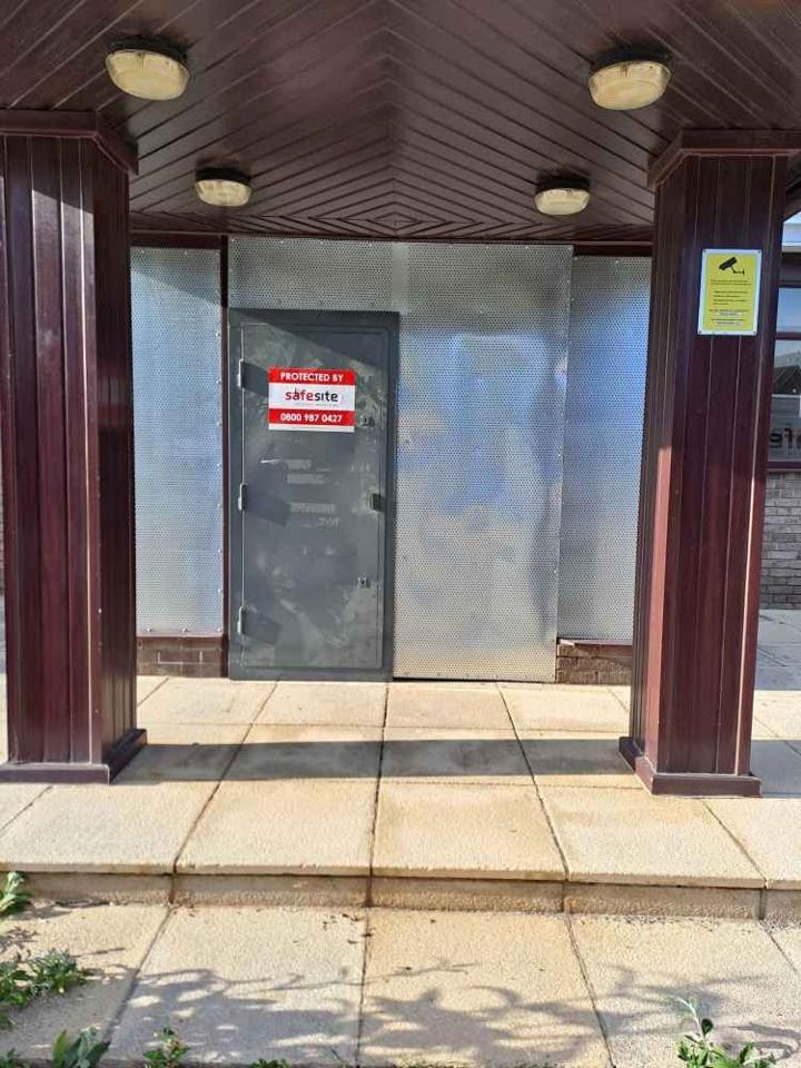 Northold-Group Entrance with Steel Security Door and Perforated Steel Sheet