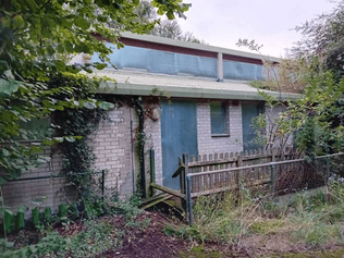 steel sheeting installed on vacant property