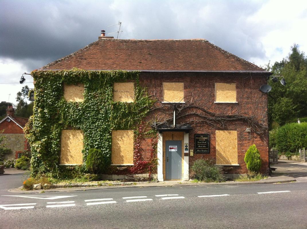 boarding up large vacant property - pub Sheffield
