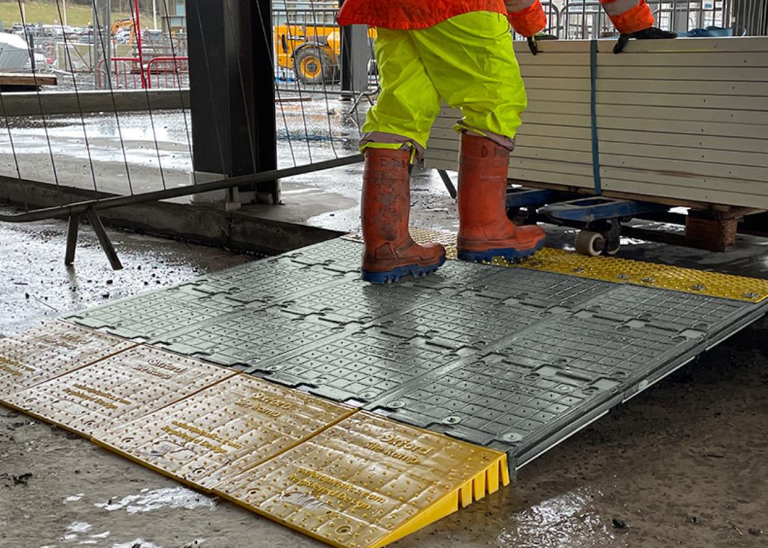 supersite ramp installed and being used with workers manoeuvring large workloads