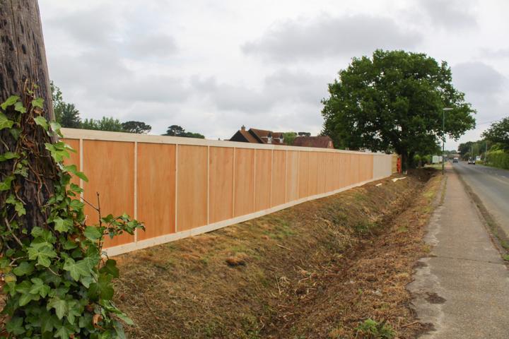 in ground timber hoarding on site