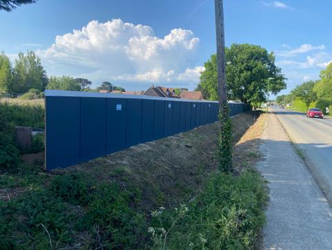 in ground timber hoarding on site