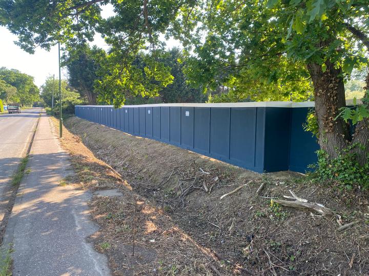 in ground timber hoarding on site