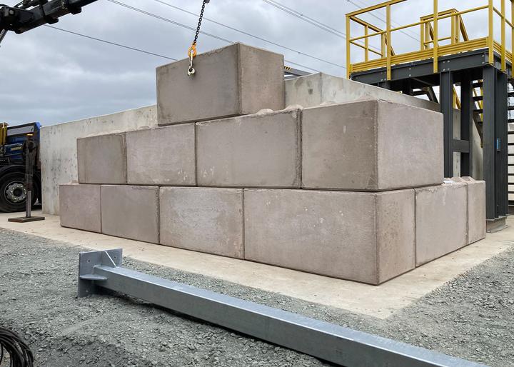 concrete barriers getting installed on site