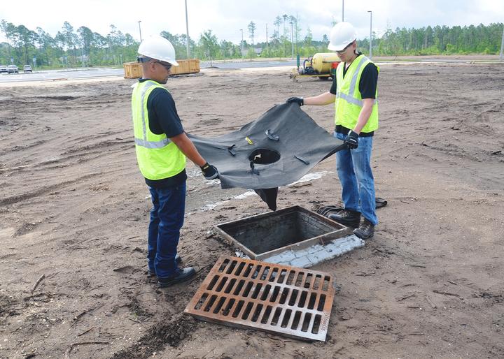 ultra drain guard being installed